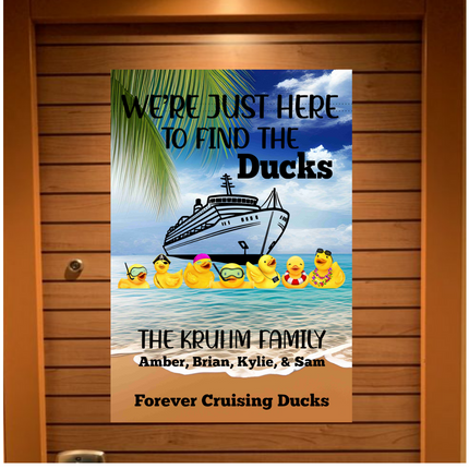 A personalized cruise door banner featuring a tropical beach scene with a cruise ship, palm leaves, and several yellow rubber ducks wearing sunglasses and accessories. The text reads “We’re Just Here to Find the Ducks” at the top, “The Kruhm Family – Amber, Brian, Kylie, & Sam” in the middle, and “Forever Cruising Ducks” at the bottom. The banner is displayed on a wooden stateroom door.