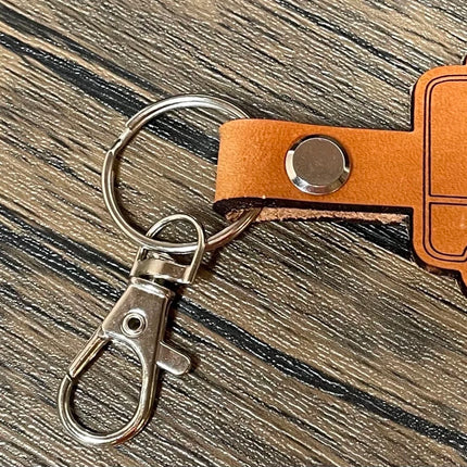 Small travel trailer leather keychain