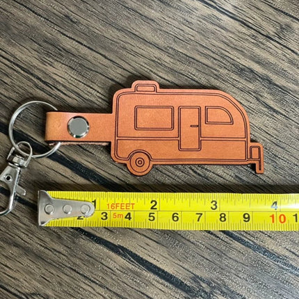 Small travel trailer leather keychain